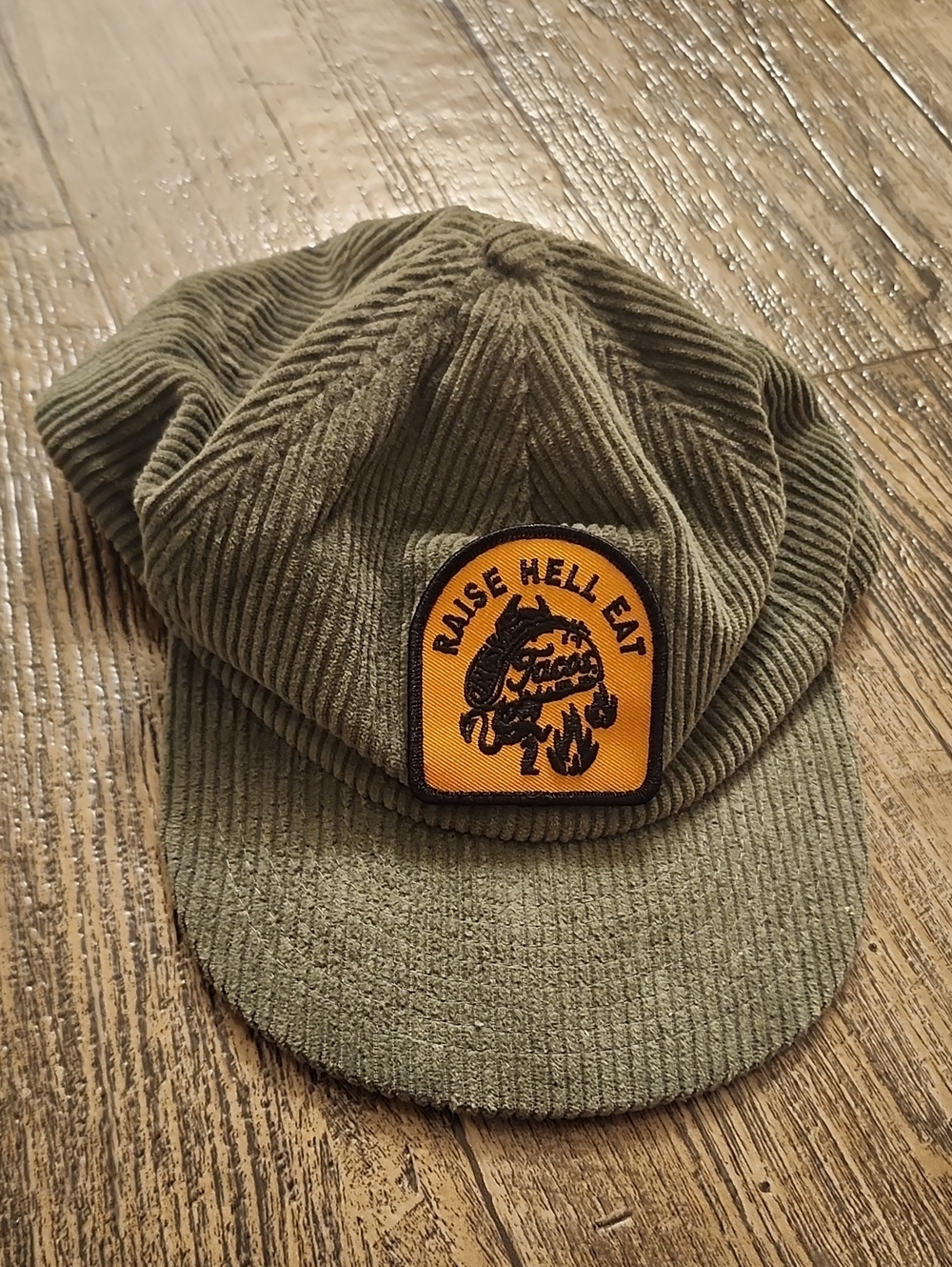 Olive Corduroy Cap with Orange 'Raise Hell Eat' Patch